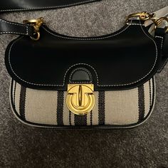 Brand New Tory Burch James Awning Small Saddle Bag. The Bag Comes With A Dust Cover. Tory Burch Crossbody Bag, Tory Burch Shoulder Bag, Tory Burch Crossbody, Gold Wallet, Hobo Crossbody Bag, Small Makeup Bag, Quilted Tote Bags, Straw Tote, Tory Burch Bags