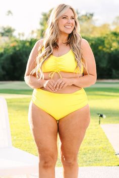 Say talk to the sand when you are wearing this amazing swim top! The yellow color is so chic and the ruching detail has an adjustable tie so you can wear this however you like! Style this cutie with the matching bottoms for a super chic pool look! 82% Polyamide, 18% Elasthane Yellow Drawstring Swimwear For Summer, Yellow Ruched Swimwear For Beach, Yellow Tankini For Pool Vacation, Ruched Swimwear For Poolside Vacation, Ruched Swimwear For Pool And Vacation, Yellow Beachy Tankini For Poolside, Beachy Yellow Tankini For The Pool, Draw Eyes, Beach Kimono