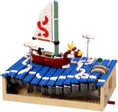 a lego boat that is floating in the water with numbers on it's side