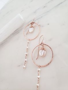 These gorgeous pearl earrings make a feminine and lovely statement while being extremely lightweight and comfortable! Perfect for a bride, date night or just for making you feel like a goddess! Genuine freshwater pearls are lovingly wire wrapped and suspended from a handmade hoop that has been hammered for a faceted, shimmery texture. Made from top quality materials, true 14k gold fill or solid sterling silver-no metal fading or wear! Excellent for sensitive ears. Come packaged in a gift box. Le Rose Gold Dangle Pearl Earrings, Rose Gold Cubic Zirconia Dangle Pearl Earrings, Dainty Rose Gold 14k Gold-filled Pearl Earrings, Handmade Rose Gold 14k Gold-filled Earrings, Bridal Earrings Rose Gold, Nickel-free 14k Gold-filled Dangle Pearl Earrings, Rose Gold Bridal Earrings, Rose Gold Pearl, Polymer Clay Flower Jewelry