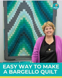 a woman standing next to a quilt made with the easy way to make a bargeello quilt