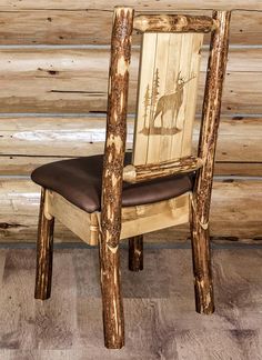 a chair made out of wood with a moose on it's back and seat