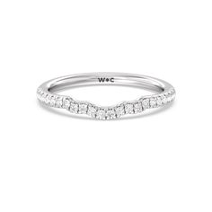 a white gold wedding band with diamonds