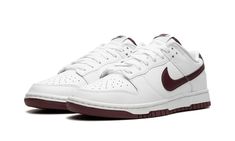 The Nike Dunk Low “White/Night Maroon” is a colorway of the legacy sneaker with clean, two-tone color scheme.  The upper has a predominantly white leather construction with a Night Maroon leather Swoosh logo on both sides.  More Night Maroon accenting can be found on the “Nike” embroidery on the heel and the “Nike” and Swoosh logos on the tongue.  Underfoot, the shoe’s white midsole and maroon outsole put the finishing touch on the design.  Release date: March 25, 2023 Maroon Shoes, Nike Embroidery, Maroon Nike, Maroon Leather, Stadium Goods, March 25, Swoosh Logo, Nike Dunk Low, Adidas Samba