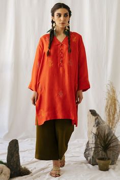 Cast a spell with this orange cotton Palazzo suit which will instantly catch your fancy.This v neck and full sleeve attire adorned with thread work.Set together with cotton palazzo pant in olive brown color with orange net dupatta.Palazzo pant is plain.Dupatta is plain.This Palazzo suit can be customised up to maximum size available in inches 68.Slight color variation may occur due to photographic reasons. Cotton Palazzo Pants, Trouser Suit, Cast A Spell, Palazzo Suit, Palazzo Pant, Net Dupatta, Thread Work, Trouser Suits, Palazzo Pants