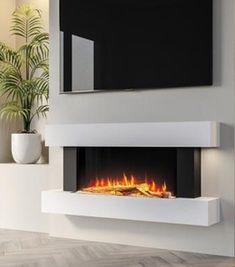 a white wall mounted electric fireplace in a living room