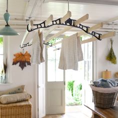 a coat rack with towels hanging from it