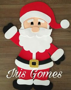 a paper cut out of santa clause with the words mrs gonee's on it