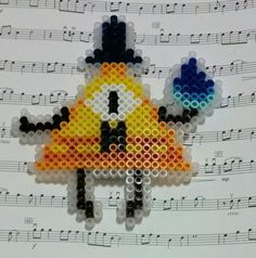 a piece of art made out of beads with music notes in the backgroud