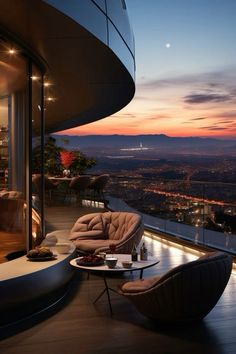 a living room filled with furniture on top of a wooden floor next to a balcony