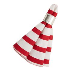 a red and white striped napkin on a white background with a silver ring around it