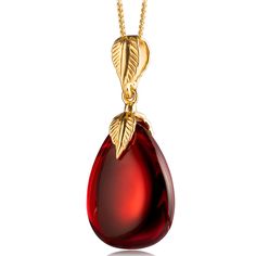 Introducing our stunning Red Amber Pendant - a true testament to the beauty and elegance of natural amber. Handcrafted with care and precision, this pendant is made of precious red amber, making it a unique and eye-catching addition to your jewelry collection. Featuring a beautiful drop/oval shape, this pendant is adorned with a gold-plated sterling silver ag925 leaf ornament fitting, ensuring both comfort and safety in use. This amber pendant is sure to turn heads with its dark red color and stunning design, making them a perfect accessory for any occasion. The pendant measures 0.78x1.65in size, making it the perfect statement piece to add to any outfit. Its impressive weight of approximately 4g is a testament to the high-quality materials used in its construction. Crafted from genuine re Blue Amber, Garnet Red, Red Pendants, Golden Necklace, Amber Pendant, Vintage Monet, Ashtanga Yoga, Ball Necklace, Yoga Jewelry