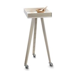 a white table with wheels and a wooden tray on the top that has a bowl in it