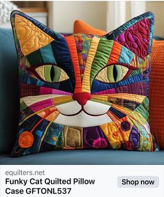 a colorful cat pillow on a couch with the caption saying, funky cat quilted pillow case gtn137