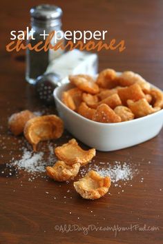 salt and pepper crackers in a bowl on a table