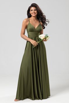 a woman in a long green dress