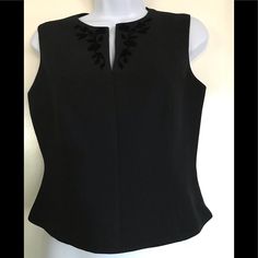 Kasper & Company A S L , Size 4 , Black , Sleeveless , Top , Beautiful Design On The Front Around Of The V Neck Area , Beautiful Velvet Like Flowers , Zipper On The Back Side Of The Top & Another Zipper On The Left Side Very Classy , Elegant,Sexy & Fluttering On ! New , Without Tag ! Elegant Black Tank Top For Formal Occasions, Black Sleeveless Blouse For Formal Occasions, Fitted Black Tank Top For Formal Occasions, Fitted Sleeveless Formal Top, Fitted Sleeveless Top For Formal Occasions, Formal Black Sleeveless Tank Top, Black Summer Formal Vest, Black Formal Summer Vest, Elegant Black Sleeveless Top