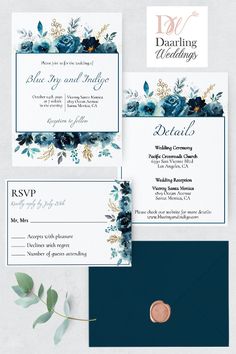 wedding stationery with blue flowers and greenery