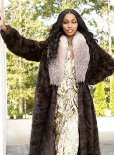 Wrap yourself in this beautiful, full-length sectioned Mink Fur coat. The full fox fur collar adds an extra touch of elegance, which is why this fabulous coat is a top seller! This style is sometimes custom-made, please allow approximately 2-3 weeks for delivery. For questions or rush orders, please use our chat or call 334-277-7610. Length: 52 inches Fur Origin - United States/Norway/Canada Dye added Don't see your size or color? Please call to see if we can custom make it for you SKU: 193112 Formal Outerwear With Faux Fur Trim, Luxury Mink Colored Evening Outerwear, Luxury Formal Fur Coat With Faux Fur Trim, Luxury Long Fur Coat, Luxury Long Coat With Faux Fur Trim, Luxury Mink-colored Evening Outerwear, Luxury Mink Color Long Fur Coat, Luxury Single-breasted Fur Coat For Winter, Classic Mink-colored Faux Fur Coat