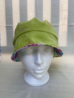 "One side of this bucket hat is lime green corduroy with pink and turquoise stars. The other side is a cotton print with pink, turquoise, and green frogs. This is a very fun and cute hat.   Head circumference  23\" (small). Machine wash warm/cold Tumble dry low" Green Frogs, Cute Hat, Green Corduroy, Green Frog, Pink Turquoise, Cute Hats, Bucket Hats, Denver Co, Head Circumference