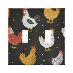 a light switch cover with chickens on black and white background, which is also available in multiple colors