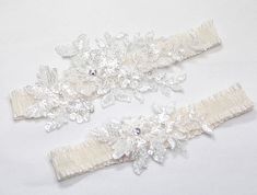 Sequin lace garter set - Rhinestone, beads and sequin are embroidered on the lace, hand sew the ivory stretch organza band. This gorgeous and glittering garter set will make your special day shine even brighter. * Sequin embroidery lace piece color - off white * Lace stretchy band available in blue, ivory, white * Each garter is made to order in my studio by hand-sewn. * It comes in two varieties, for tossing and for keepsake.  * keepsake garter lace piece size : length 6.5"  width 2.5" * comes with a pink box.  CUSTOM ORDER  Please choose your thigh size (where you will be wearing the garter) and leave your wedding date(for a timely delivery) in the "note to seller" box during your checkout. Thank you for looking! :) Sequin Garter Belt, Garters For Wedding, Garter Set Wedding, Garter Lace, Lace Garter Set, Blue Garter, Bridal Garters Set, Wedding Garter Set, Wedding Garters