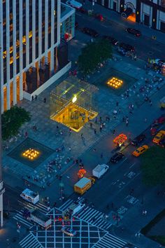 an aerial view of a city street at night