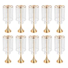 twelve gold plated candlesticks with chains hanging from the top and on each candle holder