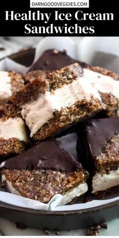 healthy ice cream sandwiches with chocolate and marshmallows on top in a pan