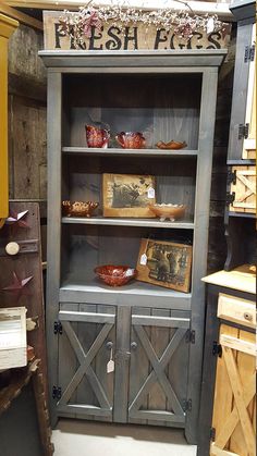 an old fashioned display cabinet in a store