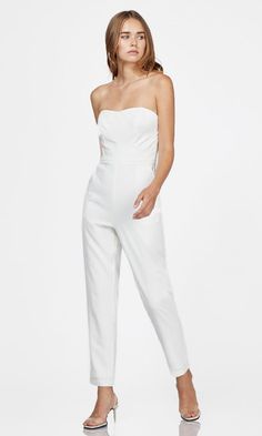 [ details ] Strapless On-seam pockets Fabric: 100% Polyester [ size and fit : based on size S ] Across chest: 16" Across hip: 19 1/2" Inseam: 27“ We recommend taking your regular size Model is 5'8" and is wearing a size Small. From a bottomless mimosa brunch with the ladies to a night out with the boo, this form-fitted halter jumpsuit will take you places in style. Wear your favorite necklace and earrings, with the perfect pair of heels, and your look is complete. Mimosa Brunch, Wrap Jumpsuit, Halter Jumpsuit, Pinstripe Dress, Luxury Women Fashion, Striped Jumpsuit, Front Tie Top, Tie Top, Slim Leg