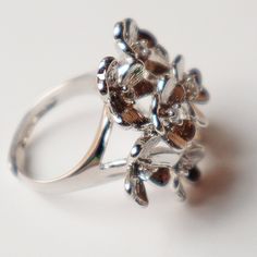 A Lucky Find! This Ring Is Charming As A Shamrock Or Floral Bouquet. - Eye Catching - Discounted Shipping - Cocktail Ring - Size 6, Adjustable Up To A Size 7 - New, Never Been Worn - 9.3 Gram Weight - Brass And Rhodium Finish For Better Durability And Luster - Tiny, Simulated Sapphires In Middle Of Each Bud Shamrock Bouquet, Bouquet Ring, Silver Shamrock, For Good Luck, Floral Bouquets, Cocktail Ring, Womens Jewelry Rings, Cocktail Rings, Good Luck