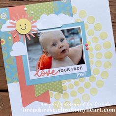 a scrapbook page with an image of a baby in the center and words love your face on it