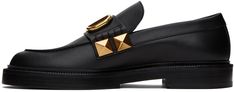 Grained calfskin loafers in black. · Moc toe · Strap and logo hardware at vamp · Signature pyramid studs at sides · Stacked leather block heel with rubber injection · Leather sole with rubber injection · Heel: H1 Supplier color: Nero Luxury Studded Loafers For Formal Occasions, Formal Leather Loafers With Studs, Formal Leather Studded Loafers, Formal Studded Leather Loafers, Luxury Business Loafers With Studded Rubber Outsoles, Luxury Leather Loafers With Studs, Luxury Studded Loafers For Business, Studded Loafers, Valentino Black