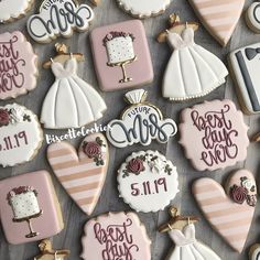 decorated cookies are arranged in the shape of bride and groom's names on display