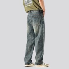 Revitalize your wardrobe this season with our mid-waist men's vintage jeans from our 2023 Autumn Collection—a blend of ageless baggy trendy and trendy stonewashed details!Why These Jeans are a Must-HaveThis timeless piece is for those who love to make a bold statement with their vogue. Its baggy fit will keep you comfy all day, while the sanded details bring a trendy edge. The zipper and button closure will make sure you look impeccable from morning to night.Features that Make It Special: Vintag Mid-rise Faded Jeans For Streetwear, Retro Faded Jeans For Streetwear, Faded Baggy Full-length Jeans, Blue Pre-washed Jeans For Streetwear, Male Hoodie, Vintage Jeans Mens, Retro Streetwear, Blue Denim Pants, Jean Vintage