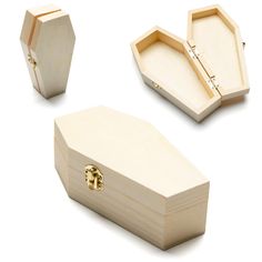 three wooden boxes with gold handles on each one and the other two are open to show their contents