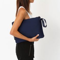 Meet the Oversized Neoprene Pouch—your new go-to accessory for work and play! This sleek pouch easily fits both 13-inch and 14-inch laptops, but it’s not all business, with enough room for your tech and a few essentials (like your phone and favorite lip balm), it's perfect for those busy days that turn into spontaneous evenings, or even for a beach weekend, and city outings! With a wristlet strap for easy carrying this oversized neoprene pouch is crafted from durable, lightweight, machine washab Essential Pouch, Beach Weekend, Wristlet Pouch, Everyday Tote, Wristlet Clutch, Makeup Pouch, Perfect Bag, Everyday Bag, Chain Bags