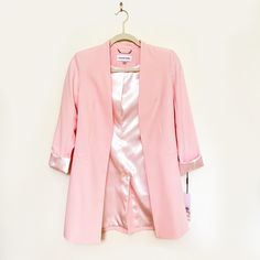 This Calvin Klein Pink Blazer Is The Perfect Piece To Top Over Any Outfit. It’s Complete With A Light Pink Silk Stripe Lining, Open Front, And Sleeves That Roll Up Or Down. Perfect To Wear This Spring Or Summer Season ‘21 For The Perfect Pop Of Pink. (New With Tags In Size 2p) Feminine Tailored Spring Blazer, Chic Calvin Klein Formal Blazer, Elegant Tailored Calvin Klein Blazer, Calvin Klein Elegant Spring Blazer, Classic Calvin Klein Blazer For Spring, Elegant Long Sleeve Calvin Klein Blazer, Calvin Klein Spring Outerwear With Notch Lapel, Calvin Klein Spring Office Blazer, Spring Office Blazer By Calvin Klein