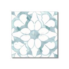 a white and blue flower design on a square tile wall mounted to the side of a building