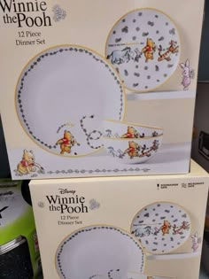 two winnie the pooh dinner sets in boxes