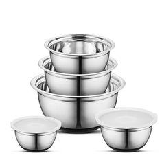 five stainless steel bowls stacked on top of each other with one bowl in the middle