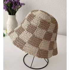 Slay in style with the Checkered Chic Bucket Hat! This trendy straw hat is perfect for any outfit and features an adjustable strap for a perfect fit. Whether you want to rock a cute, chic look or add a touch of playfulness, this bucket hat is a must-have accessory. Casual Straw Bucket Hat, Casual Beige Paper Straw Bucket Hat, Trendy Adjustable Paper Straw Hat, Trendy Woven Hats For Vacation, Trendy Woven Vacation Hat, Casual Short Brim Woven Bucket Hat, Casual Woven Bucket Hat With Short Brim, Trendy Paper Straw Hat With Curved Brim, Adjustable Trendy Paper Straw Hat