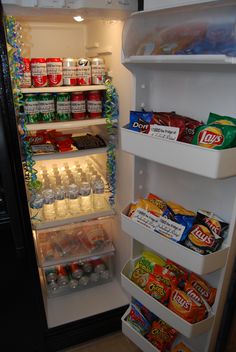 an open refrigerator filled with food and drinks