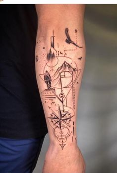 a man with a tattoo on his arm that has geometric shapes and lines all over it