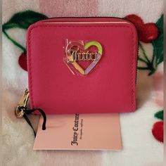 Juicy Couture Pink Flash Love Mode Small Zip Around Wallet Nwt New With Tags Gold Hardware Juicy Heart In Front In 4 Colors Detail Sold As Is. Will Ship With Care. Please See My Other Listing's To Bundle. Pink Wallets With Card Slots For Valentine's Day, Trendy Pink Compact Coin Purse, Trendy Pink Wallet With Card Slots, Trendy Pink Wallets With Card Slots, Trendy Wallets For Valentine's Day Gift, Trendy Wallets As Valentine's Day Gifts, Pink Wallet With Zipper Closure As Gift, Trendy Pink Rectangular Wallets, Compact Pink Coin Purse With Zipper