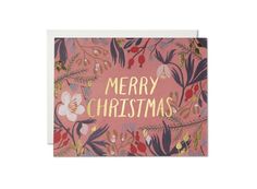 a christmas card with the words merry christmas in gold foil on pink and green leaves