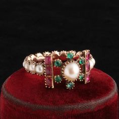 Georgian Pearl, Emerald & Ruby Eternity Ring — Erica Weiner Emerald Ring Design, Ruby Eternity Ring, Antique Ruby Ring, Ruby And Pearl, Irish Wedding Rings, Make Clay Beads, Coloured Stone Rings, Pearl Cluster Ring, Ancient Jewels