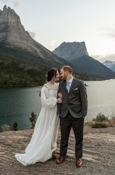 Lacey and David's Glacier National Park portraits showcase how combining your honeymoon with a bridal session can create stunning photos and lasting memories. | Bridal session tips, honeymoon bridal portraits, Montana honeymoon, Sun Point elopement