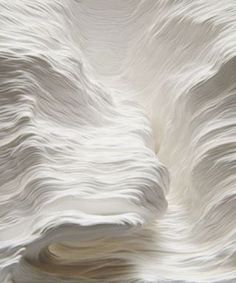 an image of white paper that looks like waves